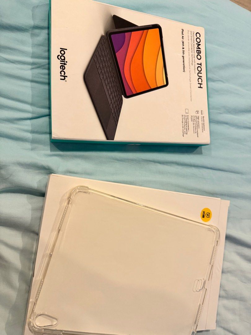 iPad Air 4th/5th Gen Cases - Logitech Combo Touch and Transparent Case (Category: Cases & Sleeves) located in Calamba. Submitted by _byagatha (Listing ID 1381937997, Image 2). Description: Logitech Combo Touch for ipad air 4th/5th gen - has signs of usage - keyboard is fully functional - case part is the only one with damage (see picture) - with free transparent case (unused) - price is slightly negotiable - rfs: need funds - payment first before