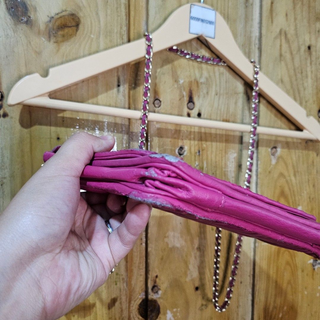 Miu Miu Sling Bag (Category: Luxury Bags & Wallets) located in Baguio. Submitted by goodfinds2600v2 (Listing ID 1381940373, Image 3). Description: Size: S Dimensions: L-6.5 W-9 Description: NGA Condition: Good Issue: rubs and leather peel, tape residue at the flop, no inside tag.