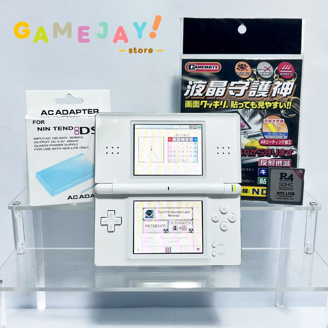 Nintendo DS Lite (Category: Nintendo) located in Manila. Submitted by gamejaystore (Listing ID 1382074695, Image 1). Description: Nintendo DS Lite - White In great working condition! 80-85% body condition. Unit comes with R4 loaded with DS games. PM lang for color availability. ✅ Good screens ✅ Good sounds ✅ Touch ✅ Buttons and triggers ✅ Good hinge ✅ Good battery life Inclusions: - Nintendo DS Lite - Charger - Flashcart - 2GB SD card - Screen pr