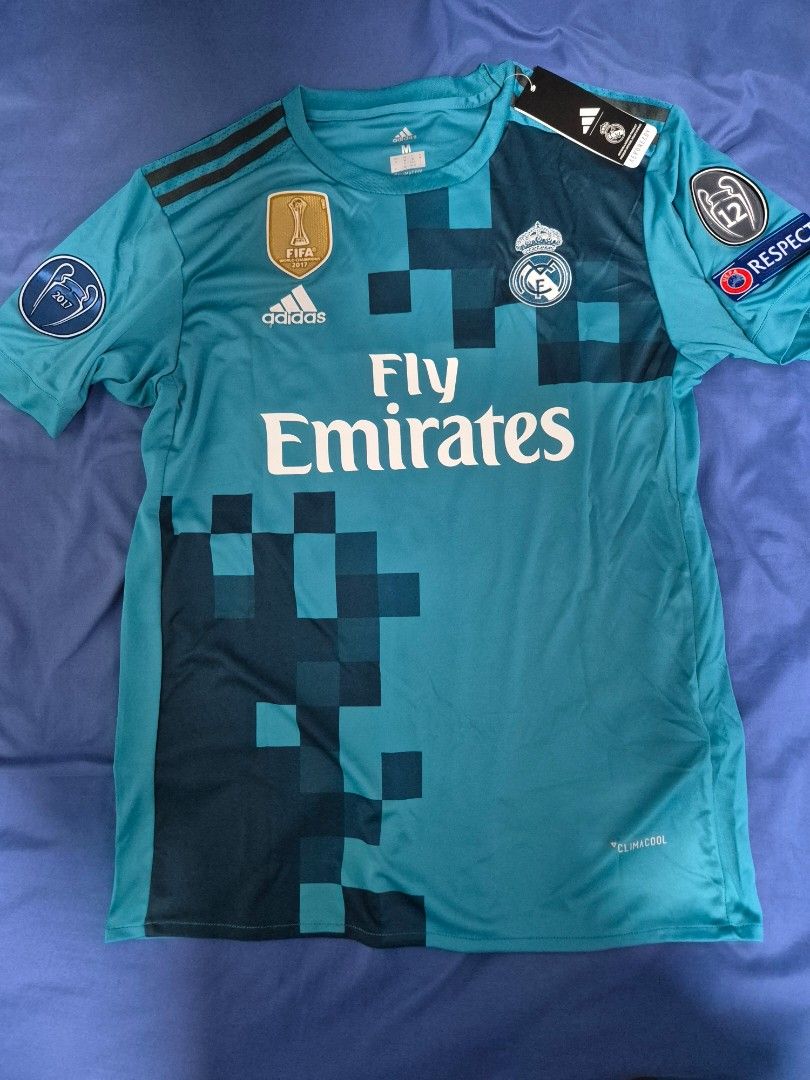 retro real madrid jersey (Category: Activewear) located in Singapore. Submitted by lianghao1013814 (Listing ID 1382016820, Image 1). Description: -2017 retro real madrid away kit -bale number 11 -never worn before -comes with tag AND bag -extra fee if i have to travel to your location -price negotiable (no lowballers).