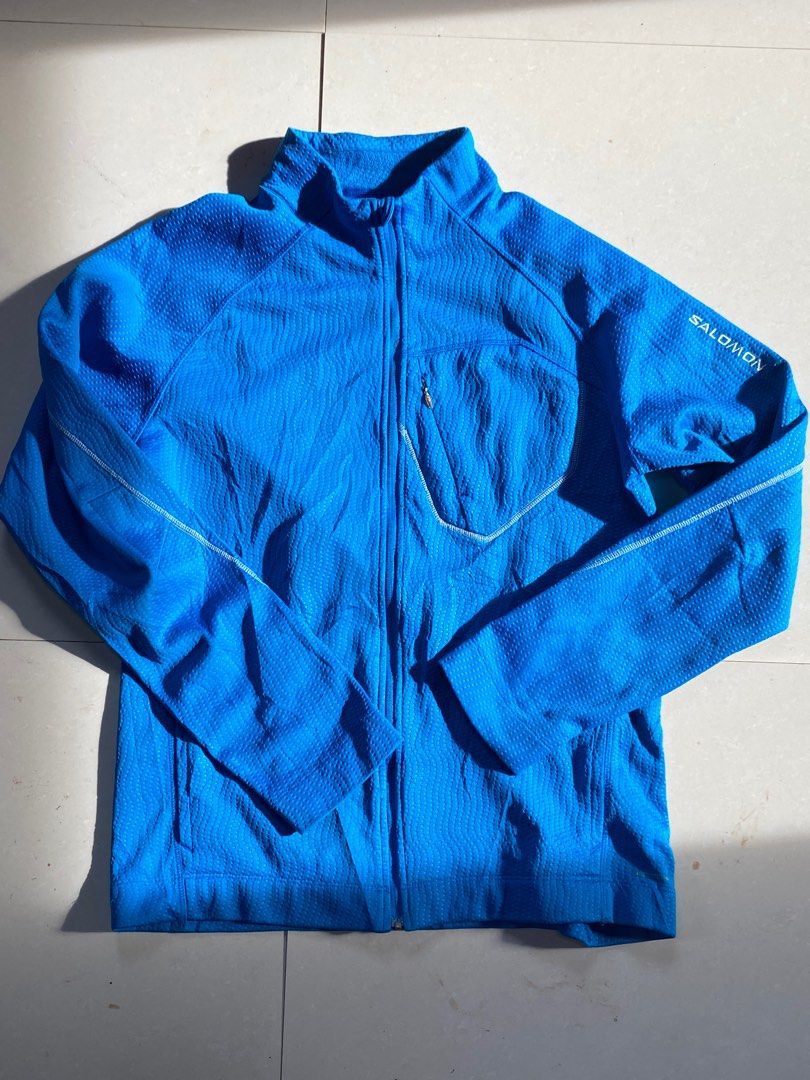 SALOMON ACTI-THERM JACKET (Category: Coats, Jackets and Outerwear) located in Cabadbaran. Submitted by jersey.cobyming (Listing ID 1381913772, Image 1). Description: L: 28 " W: 21" Size on tag: L Excellent Condition | GOOD AS NEW Minor issue: natanggal lang jelly cover in main zipper Embroidered logo.