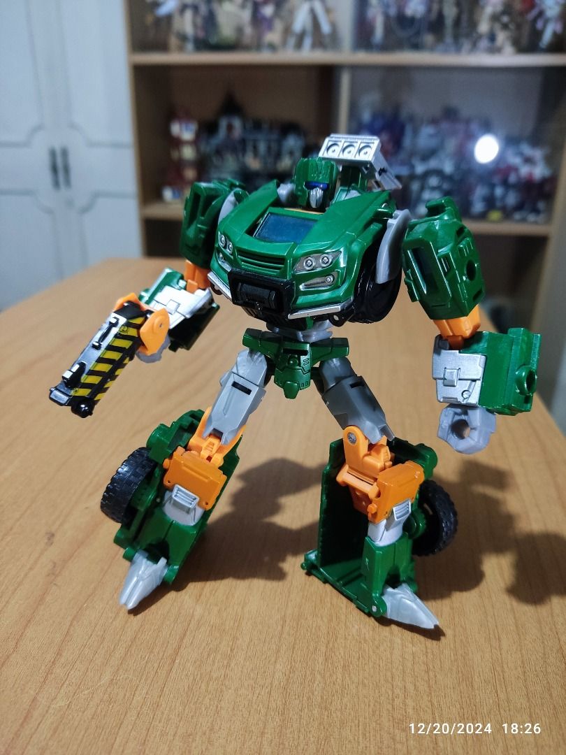 Transformers HOIST (Hasbro, 2013) (Category: Action & Battle Toys) located in Paranaque City. Submitted by coolcollectorstuff (Listing ID 1382032252, Image 2). Description: Transformers Hoist (Deluxe Class) by Hasbro - Loose but in excellent condition - Complete accessories: gun/crane - Originally released in 2013.