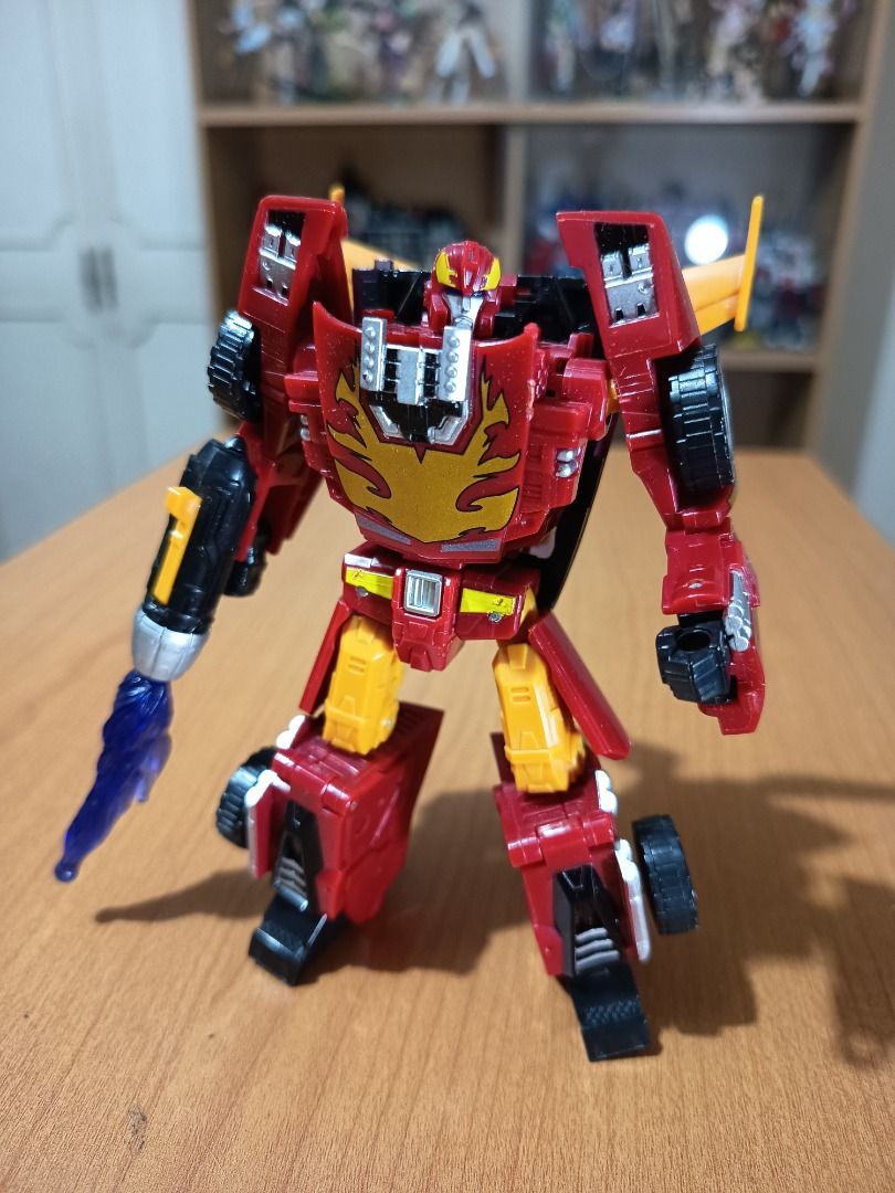 Transformers HOT ROD/RODIMUS (Hasbro, 2006) (Category: Action & Battle Toys) located in Paranaque City. Submitted by coolcollectorstuff (Listing ID 1382033283, Image 2). Description: Transformers Rodimus/Hot Rod (Deluxe Class) by Hasbro - Loose but in excellent condition - Complete accessories: gun/exhaust - Originally released in 2006.