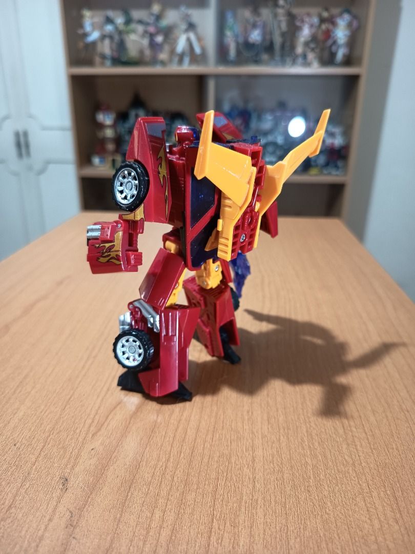 Transformers HOT ROD/RODIMUS (Hasbro, 2006) (Category: Action & Battle Toys) located in Paranaque City. Submitted by coolcollectorstuff (Listing ID 1382033283, Image 3). Description: Transformers Rodimus/Hot Rod (Deluxe Class) by Hasbro - Loose but in excellent condition - Complete accessories: gun/exhaust - Originally released in 2006.
