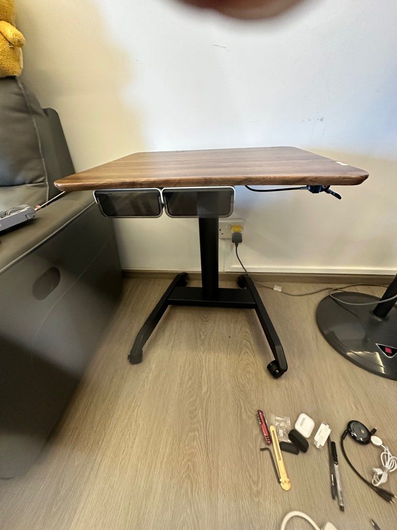 Adjustable Small Computer table (Category: Tables & Sets) located in Singapore. Submitted by motowolfsg (Listing ID 1382162930, Image 3). Description: 80cm x 64cm Height adjustable from 70cm to 110cm.