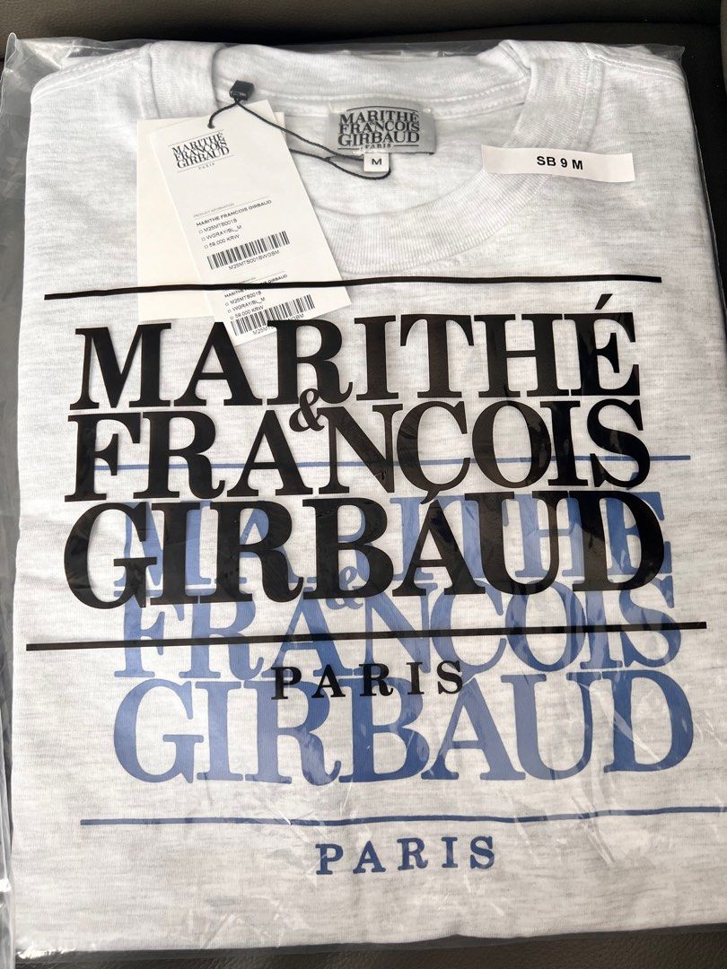 BNWT MARITHE TEE (Category: Tshirts & Polo Shirts) located in Singapore. Submitted by thefuddlewuddle (Listing ID 1382230705, Image 2). Description: Blue Men M $49.90 Pink Female M $49.90 Get both $88.88 Made in Korea.