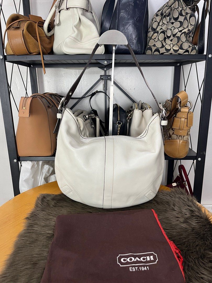 Coach Hobo bag (ivory) with dustbag (Category: Luxury Bags & Wallets) located in Quezon City. Submitted by eclipse.leandro (Listing ID 1382250948, Image 2). Description: Coach Hobo bag (ivory) with dustbag Condition: 8.5/10 33cm x 26cm 3,750 PHP All products are 100% Authentic bought from Japan. Disclaimer: We are not affiliated with the brands listed. #LuvLuxe #LuxuryJPNFinds.