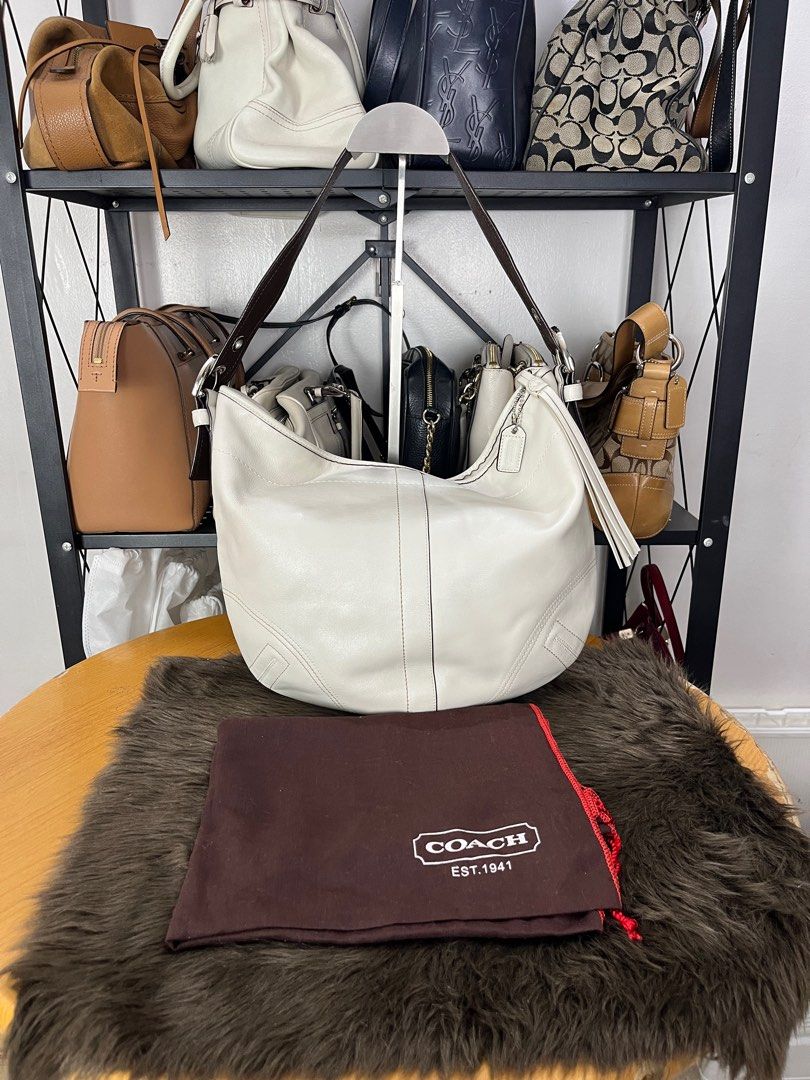 Coach Hobo bag (ivory) with dustbag (Category: Luxury Bags & Wallets) located in Quezon City. Submitted by eclipse.leandro (Listing ID 1382250948, Image 1). Description: Coach Hobo bag (ivory) with dustbag Condition: 8.5/10 33cm x 26cm 3,750 PHP All products are 100% Authentic bought from Japan. Disclaimer: We are not affiliated with the brands listed. #LuvLuxe #LuxuryJPNFinds.