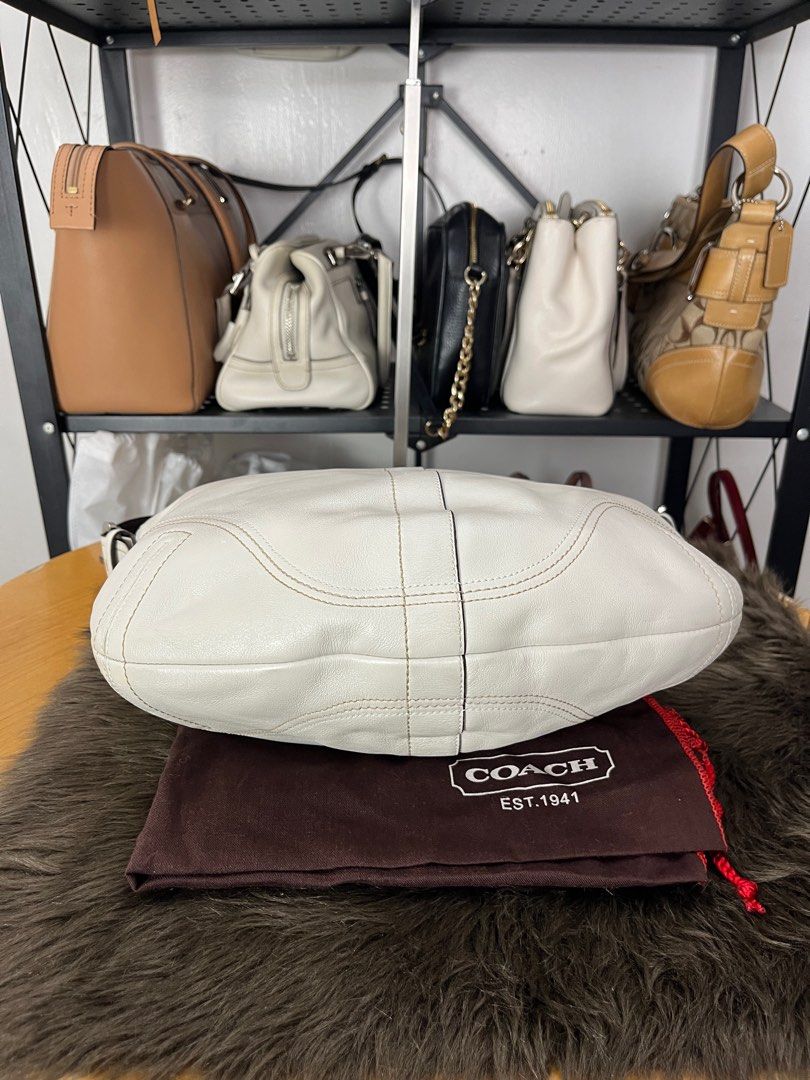 Coach Hobo bag (ivory) with dustbag (Category: Luxury Bags & Wallets) located in Quezon City. Submitted by eclipse.leandro (Listing ID 1382250948, Image 3). Description: Coach Hobo bag (ivory) with dustbag Condition: 8.5/10 33cm x 26cm 3,750 PHP All products are 100% Authentic bought from Japan. Disclaimer: We are not affiliated with the brands listed. #LuvLuxe #LuxuryJPNFinds.