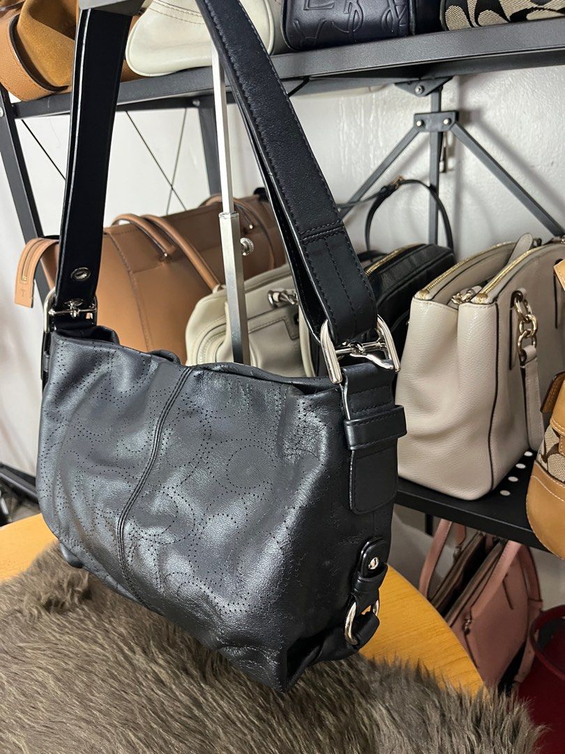 Coach Hobo Shoulder Bag with Perforated Logo (Black) (Category: Luxury Bags & Wallets) located in Quezon City. Submitted by eclipse.leandro (Listing ID 1382250121, Image 3). Description: Coach Hobo Shoulder Bag with Perforated Logo (Black) Condition: 9/10 24cm x 14.5cm 3,500 PHP Issue: no coach tag All products are 100% Authentic bought from Japan. Disclaimer: We are not affiliated with the brands listed. #LuvLuxe #LuxuryJPNFinds.