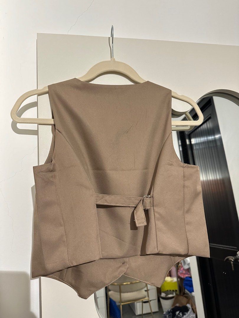 Crop Waistcoat (Category: Sleeveless) located in Marilao. Submitted by pgbdc (Listing ID 1382185405, Image 2). Description: - with Adjustable Back Belt - dark khaki - size: medium (50-55kg) - never worn.