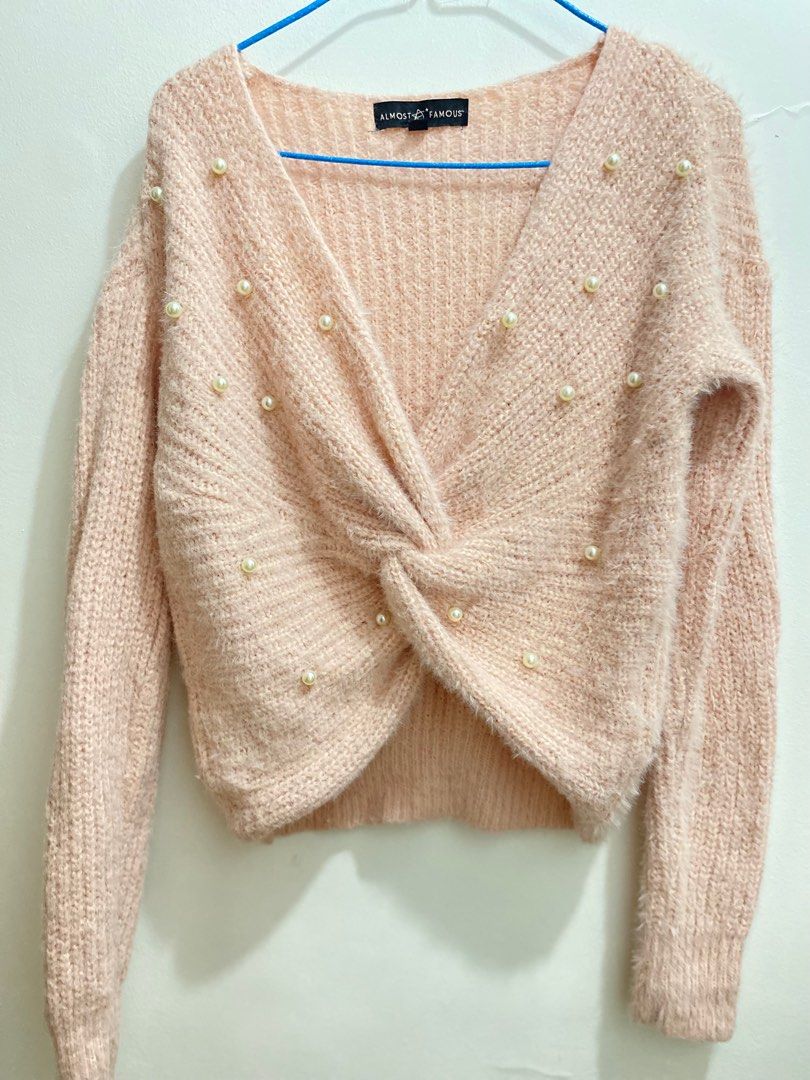 Cropped knitted fur cardigan (Category: Others Tops) located in Cavite. Submitted by eessaa08 (Listing ID 1382261565, Image 1). Description: Color: baby pink Size: small- semi med Item description: With pearl beads, fur type, knitted longsleeves MOP: Gcash MOD: Lalamove or Jnt Location: Cavite City.