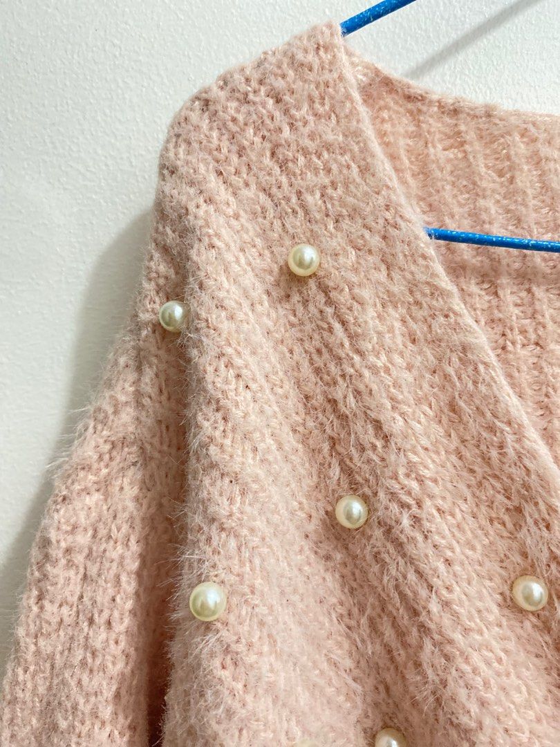 Cropped knitted fur cardigan (Category: Others Tops) located in Cavite. Submitted by eessaa08 (Listing ID 1382261565, Image 3). Description: Color: baby pink Size: small- semi med Item description: With pearl beads, fur type, knitted longsleeves MOP: Gcash MOD: Lalamove or Jnt Location: Cavite City.