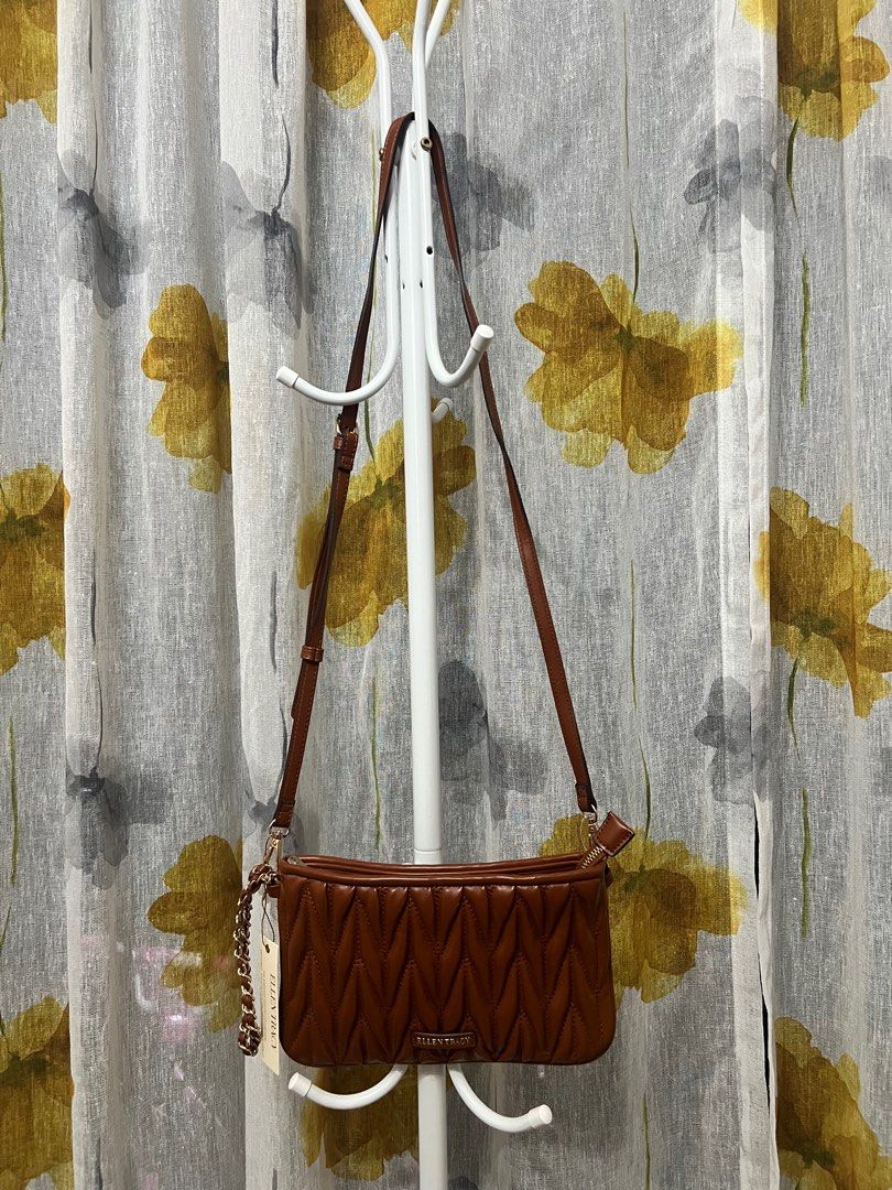 Ellen Tracy Zippered Wristlet with detachable Strap (Category: Purses & Pouches) located in Pasig City. Submitted by _aboutagal (Listing ID 1342014603, Image 1). Description: Ellen Tracy Zippered Wristlet with detachable Strap Brown SRP: $78 Selling: ₱3,000 Brand new with tag On hand & ready to ship!.