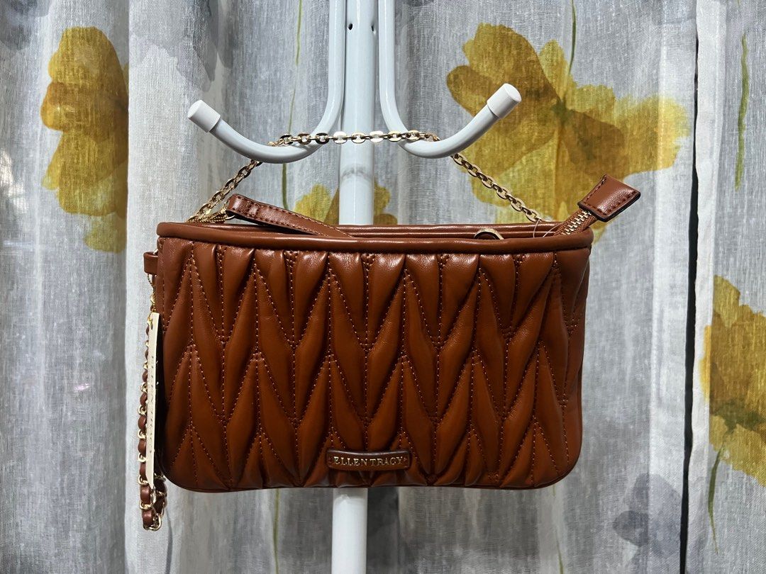 Ellen Tracy Zippered Wristlet with detachable Strap (Category: Purses & Pouches) located in Pasig City. Submitted by _aboutagal (Listing ID 1342014603, Image 2). Description: Ellen Tracy Zippered Wristlet with detachable Strap Brown SRP: $78 Selling: ₱3,000 Brand new with tag On hand & ready to ship!.