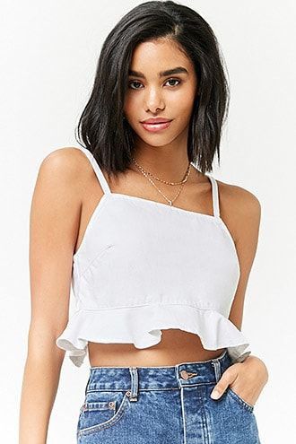 FOREVER21 white solid denim peplum crop top (Category: Sleeveless) located in Pasig City. Submitted by croisshark (Listing ID 1382211258, Image 1). Description: flattering denim crop top with zipper back closure and a structured frill hem looks so good paired with a cropped white denim jacket! :)) https://carousell.app.link/f4fGBmj0cVb best fits S.