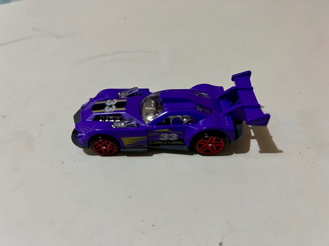 Hot Wheels bootleg (Category: Vehicle & Diecast Models) located in Paranaque City. Submitted by jmddelacruz (Listing ID 1382145325, Image 1). Description: Hot Wheels bootleg Not Hot Wheels Unbranded Condition: Mint Scale: aproximately 1:64 Diecast metal body, plastic base Rolling wheels Color: Purple Pick up at BF Homes, Paranaque City or Lalamove delivery, fee to be shouldered by buyer Thank you .