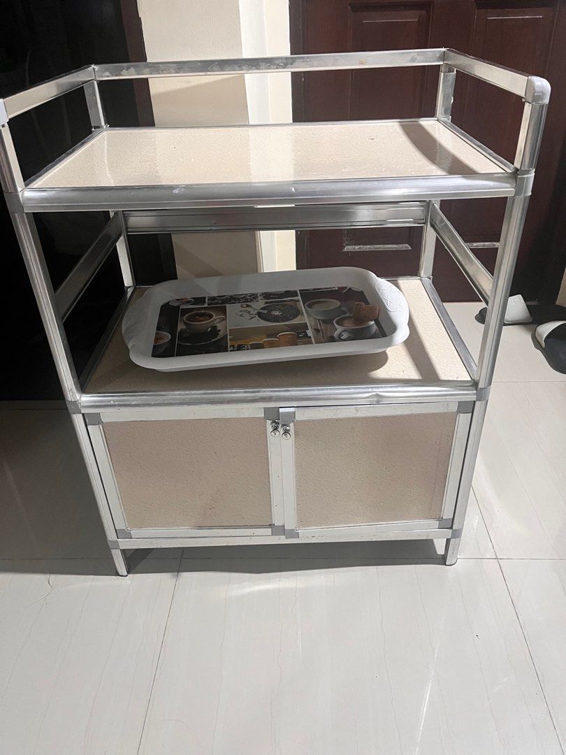 kitchen storage rack (Category: Other Home Appliances) located in Rizal. Submitted by authenticity17 (Listing ID 1382207193, Image 3). Description: Kitchen storage rack used useful for storing utensils or caseroles can be used for storage in kitchen equipment and groceries.