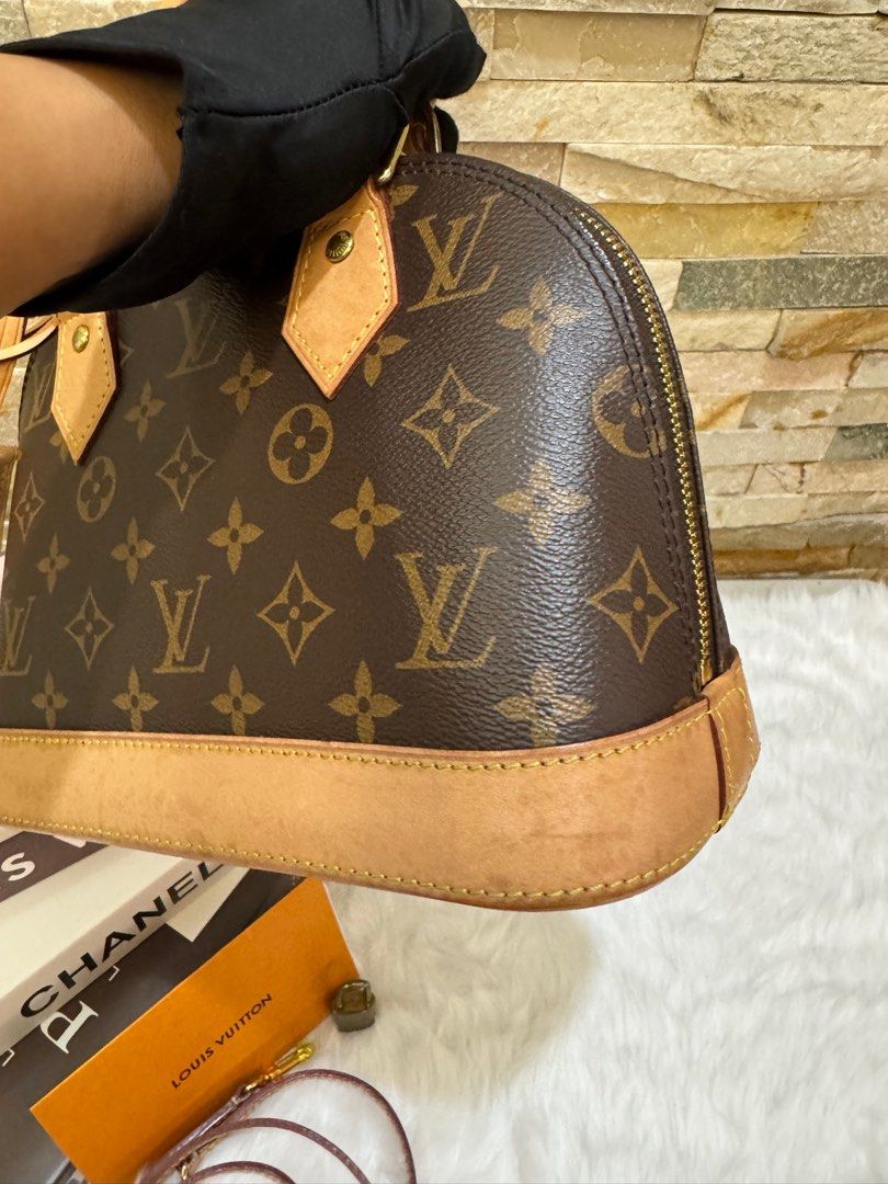 LV Monogram Alma BB (Category: Luxury Bags & Wallets) located in Taguig. Submitted by angelbellaclaire (Listing ID 1382291944, Image 3). Description: ✨ Louis Vuitton Alma BB in Monogram Canvas A timeless icon in a petite size — elegant, structured, and always in style! 👜 Details: • Style: Alma BB • Material: Monogram coated canvas with natural cowhide leather trim • Hardware: Gold-tone • Size: Approx. 9.8” L × 7.5” H × 4.7” W (25 × 19 × 12 cm) •