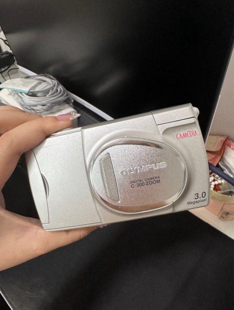 OLYMPUS CAMEDIA C-300 ZOOM (Category: Cameras) located in Manila. Submitted by bum2me (Listing ID 1382280414, Image 1). Description: body cosmetics: 8.5/10 has a hairline scratch/es and spec/s of dirt inclusions: unit 32 Mb smartmedia card smartmedia card reader (bought online, priced around 900) 4 double A eveready alkaline batteries rfs: the unit has only just been stored. also need funds for school disclaimer: the camera is working perfectly f