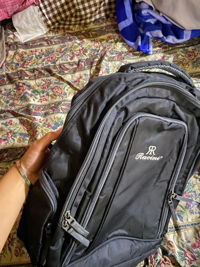 Racini 3 big compartments and 2 small compartment black backpack (Category: Backpacks) located in Caloocan City. Submitted by lienzonius (Listing ID 1382255914, Image 3). Description: Super spacious and malaki talaga. May issue nga lang. Need ng tahi (see photo).