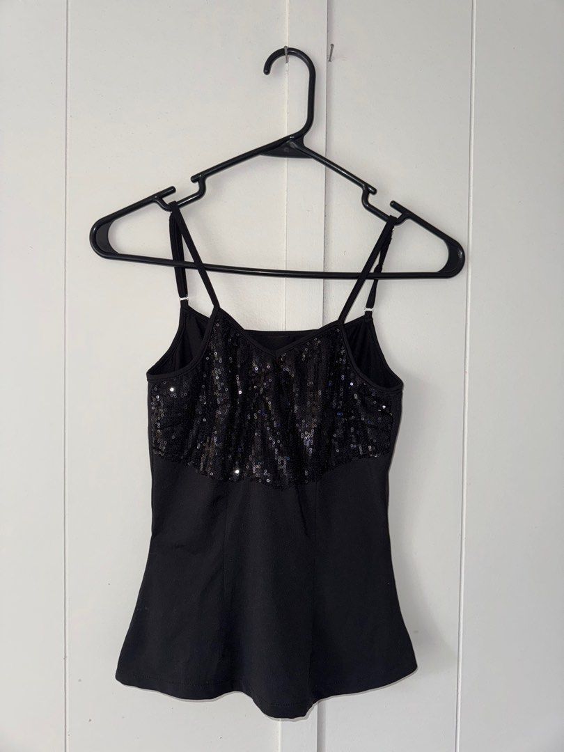 Sequin sleeveless top (Category: Sleeveless) located in Manila. Submitted by saintizzy (Listing ID 1382149916, Image 2). Description: 🏷️ Fits xxs-s 🖤 Very flattering and easy to style 🖤 No brand & tag - thrifted 🖤 Sure buyers only 🧾 MOP: Gcash only.