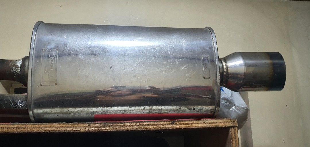 5zigen Japan (Category: Mufflers and Exhaust Parts and Accessories) located in Cainta. Submitted by Bishop555 (Listing ID 1382374922, Image 2). Description: RaRe 5zigen chambered muffler Orig! serial,badge, bunrt tip...made in japan. nka stock lang sa bodega dna naggamit extra. pick up at filinvest east marcos hiway..