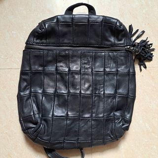 Mochila de cuero genuino con parches