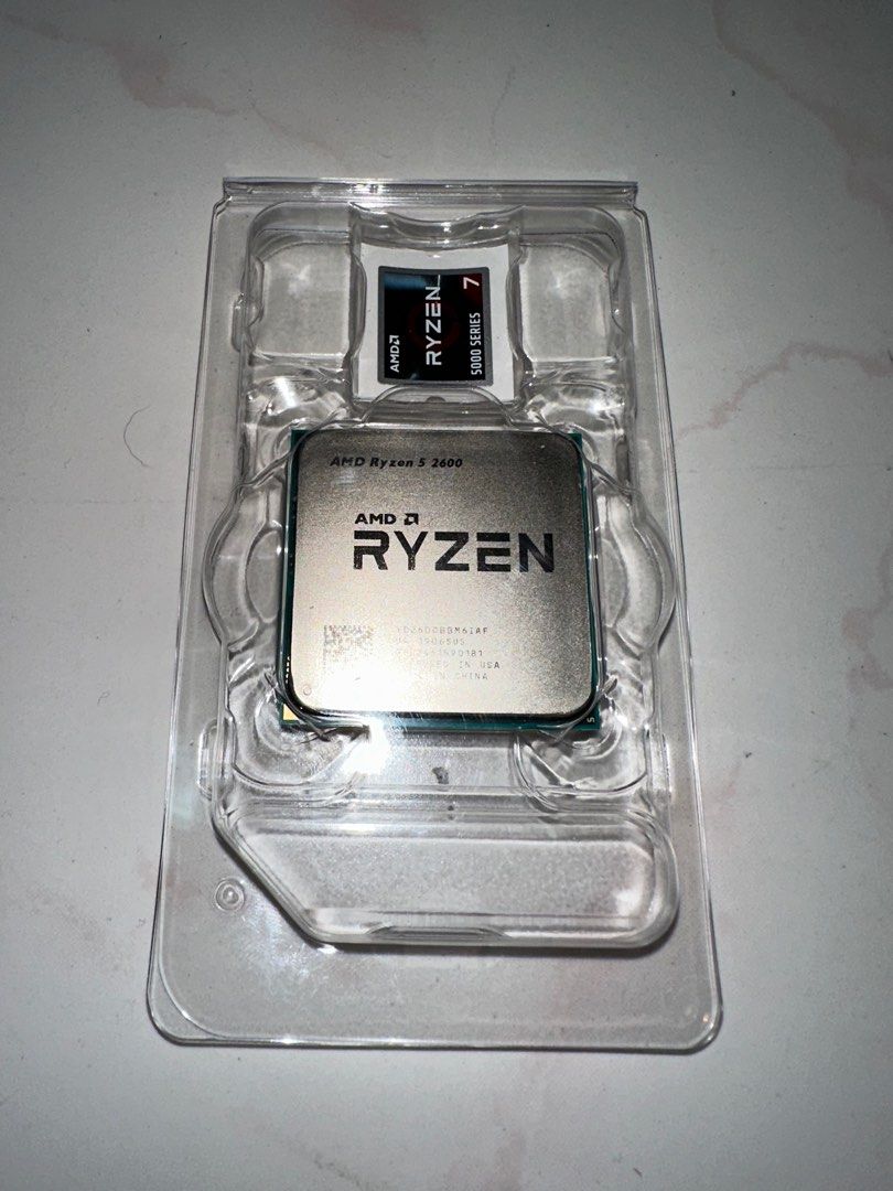 AMD Ryzen 5 2600 CPU (Category: Computer Parts) located in Singapore. Submitted by bikelover0000 (Listing ID 1382300969, Image 2). Description: - AMD Ryzen 5 2600 CPU - Includes original cooler - Excellent condition - Comes with original packaging - Ideal for budget gaming or productivity builds.