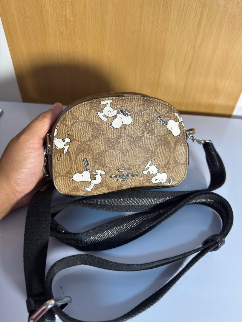 Authentic Coach x Peanuts Sling (Category: Luxury Bags & Wallets) located in Paoay. Submitted by ysmattic (Listing ID 1382306659, Image 3). Description: Guaranteed authentic Coach x Peanuts Serena Mini sling bag. No flaws at all. .