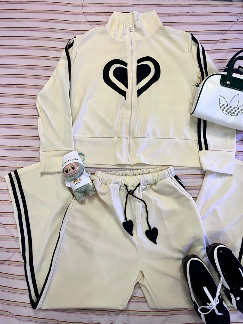beige heart terno tracksuit coordinates - jacket and jogging pants (Category: Sets or Coordinates) located in Bacoor. Submitted by preluvedbyasia (Listing ID 1382401197, Image 2). Description: fits sizes small-medium 25-28 track zip up jacket & wide leg jogging pants comfy to wear! message me if you have more questions! 📍bacoor mop: gcash.
