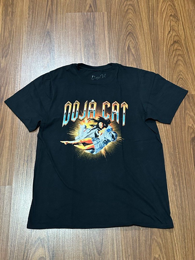 Doja Cat Planet Her T-Shirt (Category: Tshirts & Polo Shirts ) located in Marikina City. Submitted by musicandmakeup (Listing ID 1382449533, Image 1). Description: Only used once. Still in good condition Size M Width - 20in Length - 27in.