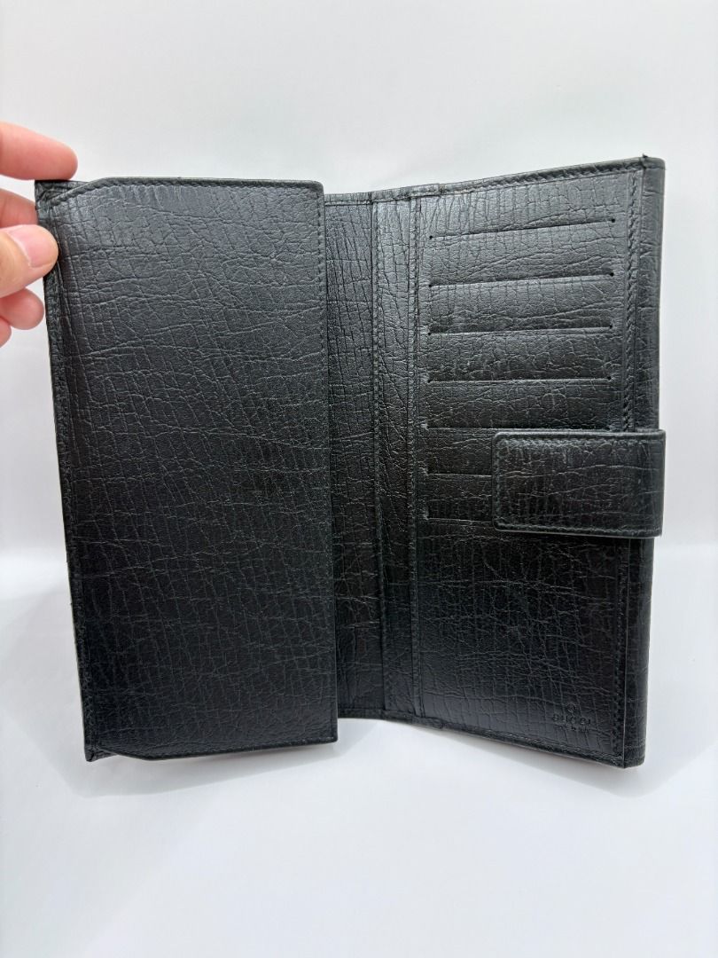 Gucci Bamboo Bifold Wallet (Category: Luxury Bags & Wallets) located in Manila. Submitted by summercookie (Listing ID 1381793547, Image 2). Description: Used Condition 8/10 - sold as is, check photos Back button clasp is broken With box and card Material: Grained leather with gunmetal hardware Measurements: Width: 7.5" x Height: 4" x Depth: 0.75" - single exterior slit pocket with snap closure at front face featuring bamboo adornment - tonal leat