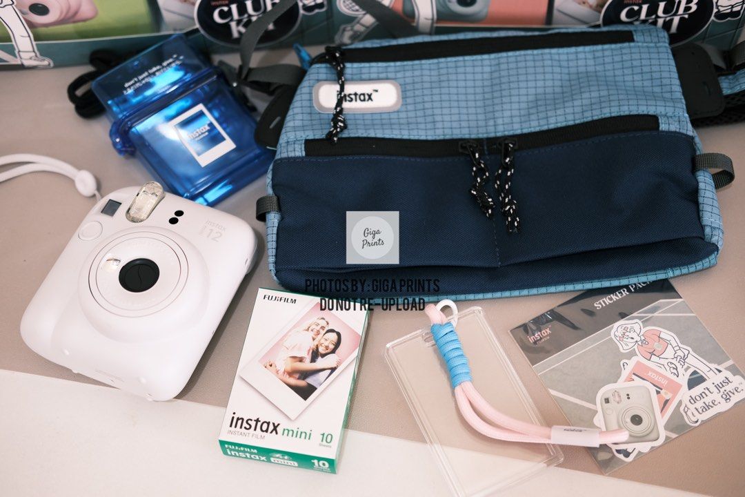 Instax Mini 12 Club Kit (Category: Cameras) located in Quezon City. Submitted by bdsdc1998 (Listing ID 1382358211, Image 2). Description: New Fujifilm Instax Bundle Mini 12 Club Kit 5,599 🔖 📦INCLUSIONS: -Sporty Sling Bag -Waterproof Photo Film Case -Keychain With Photo Holder -Sticker Sheet -Instax Mini 12 Camera -10 Sheets Instax Mini Film -Batteries -Strap -Users Manual -Warranty Papers Giga Prints Freebies: -Button Pins -Drawstring Pouch -St