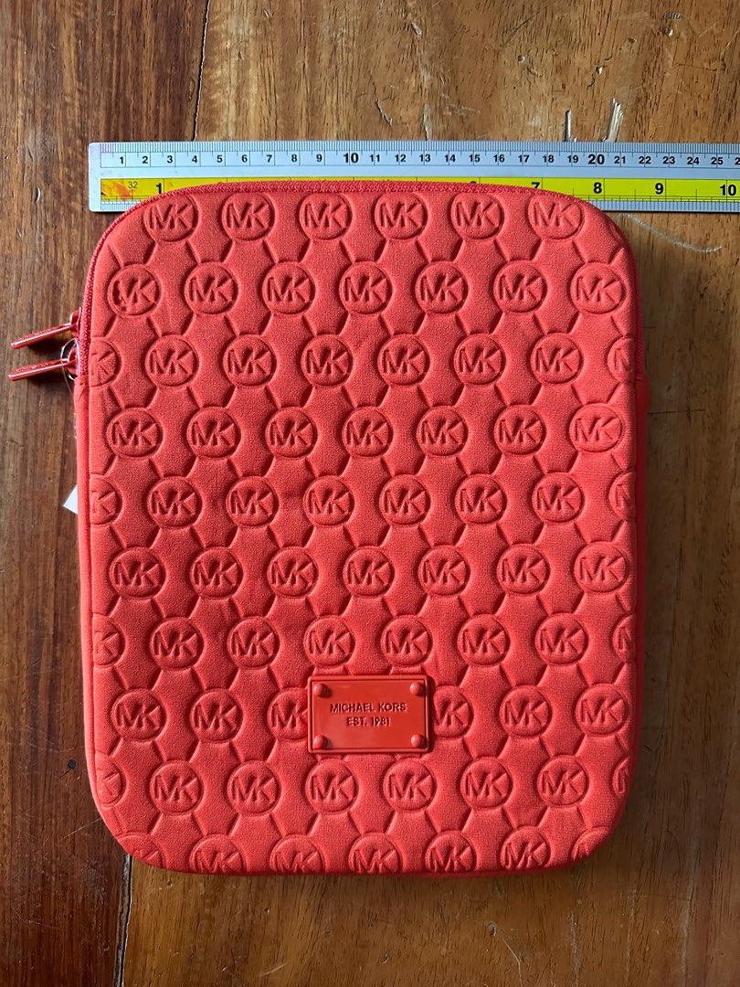 iPad case (Category: Luxury Bags & Wallets) located in Mandaluyong City. Submitted by bumbletumble (Listing ID 1382326243, Image 2). Description: Brand new Michael Kors iPad case Size 8” x 10” inches Rfs: decluttering .