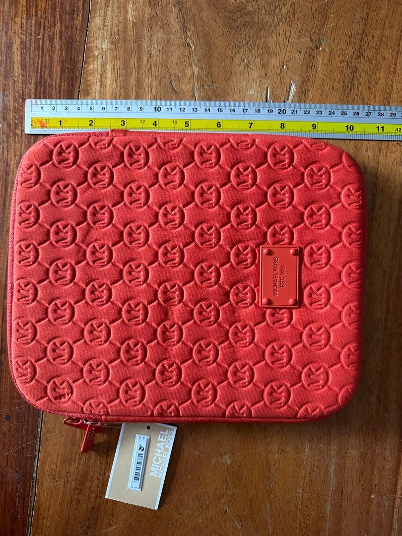 iPad case (Category: Luxury Bags & Wallets) located in Mandaluyong City. Submitted by bumbletumble (Listing ID 1382326243, Image 3). Description: Brand new Michael Kors iPad case Size 8” x 10” inches Rfs: decluttering .