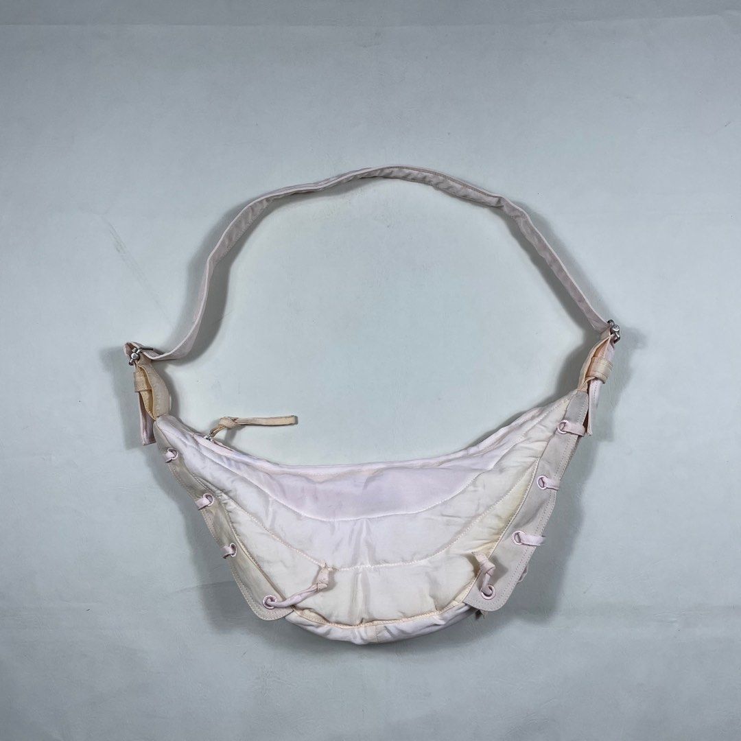 LEMAIRE PINK SOFT GAME BALL SHOULDER BAG (Category: Luxury Bags & Wallets) located in Manila. Submitted by revise.ph_ (Listing ID 1382328329, Image 3). Description: LEMAIRE PINK SOFT GAME BALL SHOULDER BAG Made in TUNISIA Length/Height:7.5 Width:21 Side Width:4 Condition:7.5/10 ISSUE: YELLOW STAIN / BLEED STAIN Price:15,000 Free Shipping in Jnt.
