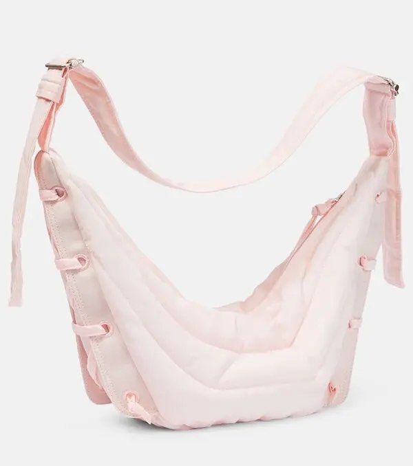 LEMAIRE PINK SOFT GAME BALL SHOULDER BAG (Category: Luxury Bags & Wallets) located in Manila. Submitted by revise.ph_ (Listing ID 1382328329, Image 2). Description: LEMAIRE PINK SOFT GAME BALL SHOULDER BAG Made in TUNISIA Length/Height:7.5 Width:21 Side Width:4 Condition:7.5/10 ISSUE: YELLOW STAIN / BLEED STAIN Price:15,000 Free Shipping in Jnt.