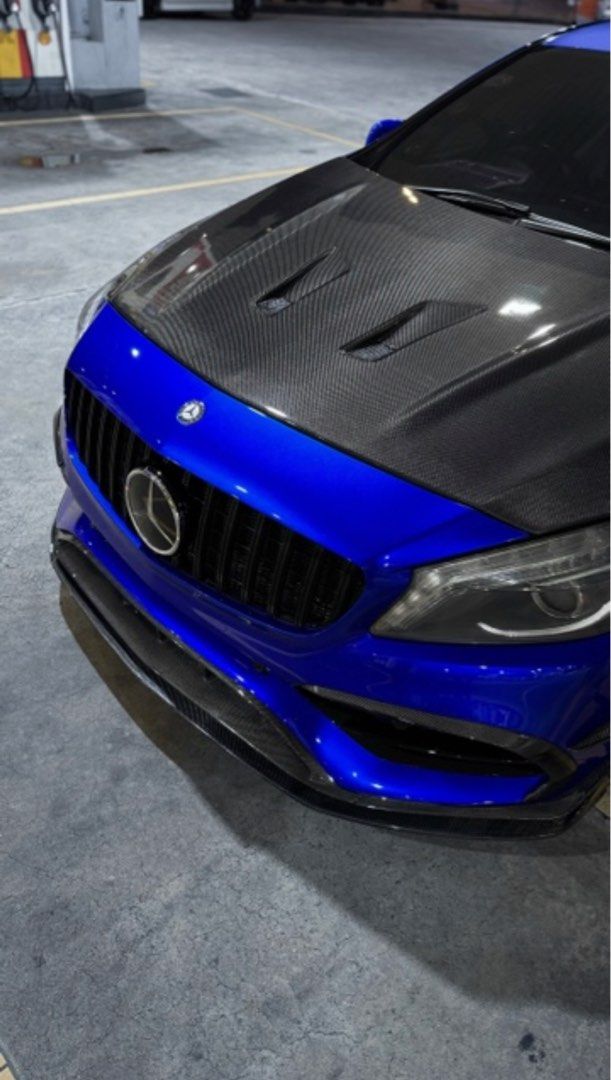 Mercedes-Benz A-Class A200 Style (A) (Category: Used Cars) located in Singapore. Submitted by trickzcart (Listing ID 1382331635, Image 2). Description: Alot done up to this car. -Aikka Candy blue w Glasruit clear coat. Sprayed in and out. -A45 bodykit w carbon fibre parts & hood -Remus Exhaust w cert -Bcbr Coilovers -Custom Air Intake -Ambient lights.