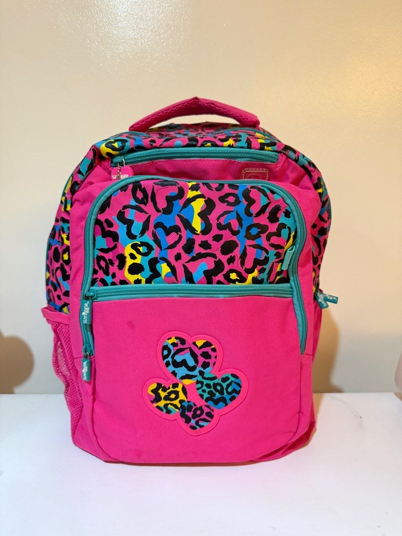 Original Smiggle Leopard Print Backpack (Category: Babies & Kids Fashion) located in Las Pinas. Submitted by slua19 (Listing ID 1382424288, Image 1). Description: SLIGHTLY NEGOTIABLE FOR SURE BUYERS - Bought in Smiggle Singapore store for ₱4000+ - Used only thrice - Slightly dirty at the bottom, but can be cleaned - No damages - Chat for more pics :) .