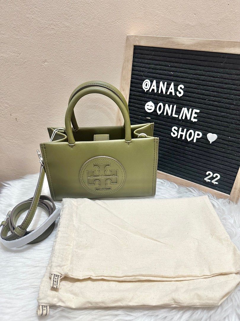 Original Tory Burch Ella Bio mini tote green Leather (Category: Luxury Bags & Wallets) located in Las Pinas. Submitted by anasonlineshophtplaspinas (Listing ID 1382455639, Image 1). Description: Original Tory Burch Ella Bio mini tote green Leather Faux leather item Two rigid handles Magnetic fastening Internal flat pocket Adjustable and removable leather shoulder strap Silver-tone metal hardware Herringbone fabric lining Width: 18,5 cm Height: 12