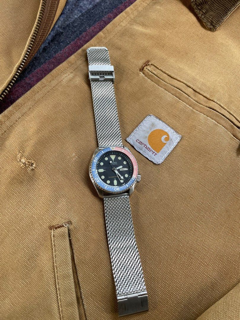 SIEKO SKX009 Scuba Diver's Watch (Category: Men's Watches) located in Lantapan. Submitted by JuanPick (Listing ID 1382405379, Image 3). Description: Authentic All Original Head AM Jubilee Bracelet Recently Serviced Unpolished Creating An Well Aged Patina The Seiko SKX009 is one of the most iconic diver watches in Seiko’s lineup, introduced in the late 1990s. Known for its robust construction, reliable automatic movement (7S26), and distinct Pepsi