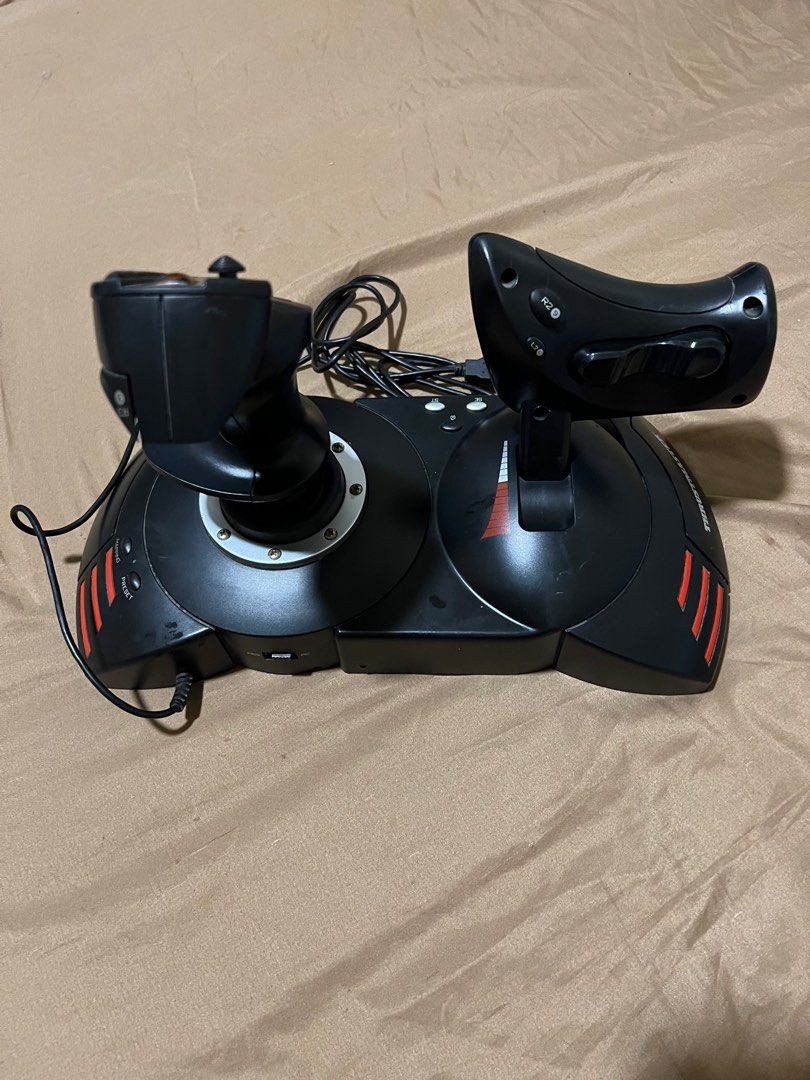Thrustmaster T-Flight Hotas X (Category: Controllers) located in Makati City. Submitted by affordableeleganceemporium (Listing ID 1382301106, Image 1). Description: 🎮 Thrustmaster T.Flight HOTAS X – Compact Flight Stick & Throttle Combo Step into immersive flight simulation with the T.Flight HOTAS X—a portable, high-value setup featuring a joystick and full-size detachable throttle, made for PC (and PS3 legacy support). Designed for budding pilo