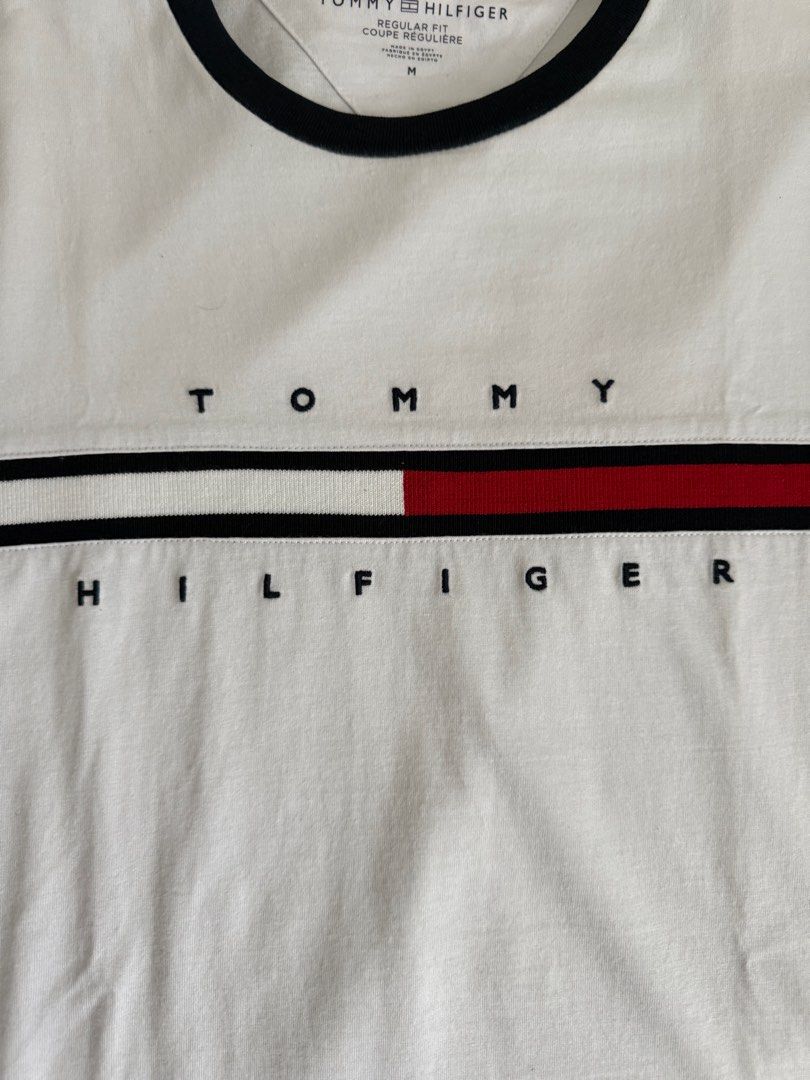 Tommy Hilfiger Shirt Medium White (Category: Tshirts & Polo Shirts ) located in Baliuag. Submitted by jaredcarousel (Listing ID 1382323777, Image 2). Description: Tommy Hilfiger Shirt White / Navy Logo Embroidered Size: Medium 999 + SF Used once only. RFS: Decluttering.