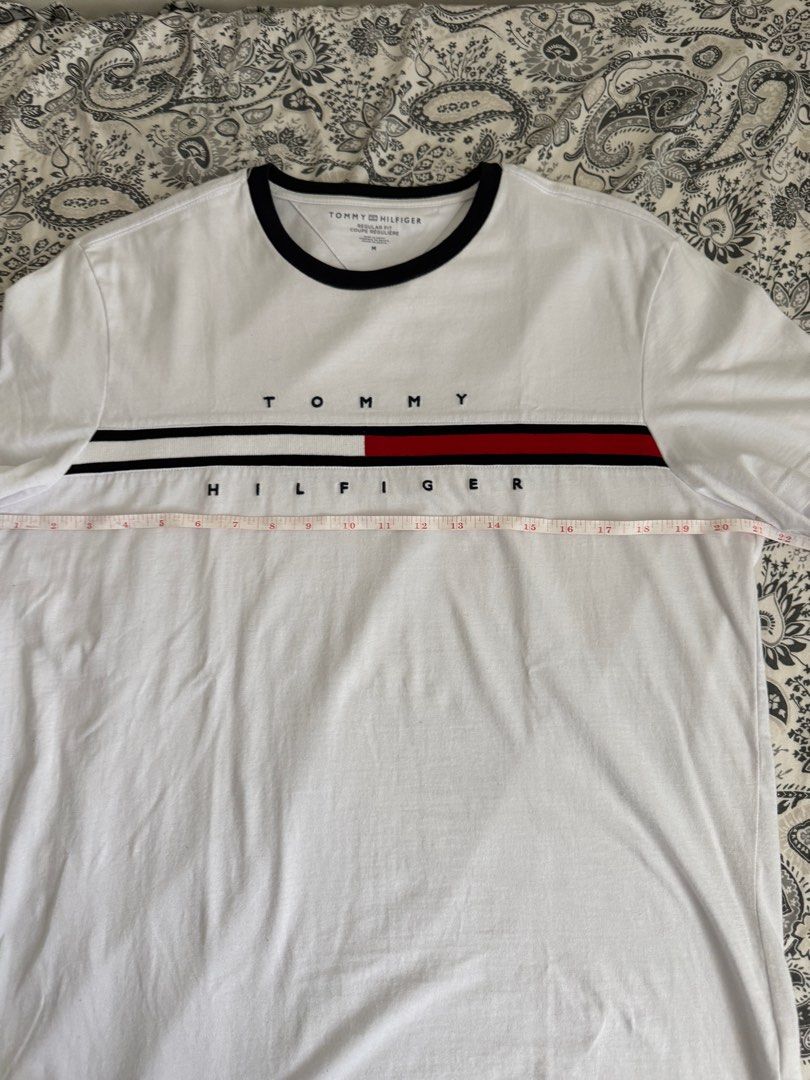 Tommy Hilfiger Shirt Medium White (Category: Tshirts & Polo Shirts ) located in Baliuag. Submitted by jaredcarousel (Listing ID 1382323777, Image 3). Description: Tommy Hilfiger Shirt White / Navy Logo Embroidered Size: Medium 999 + SF Used once only. RFS: Decluttering.