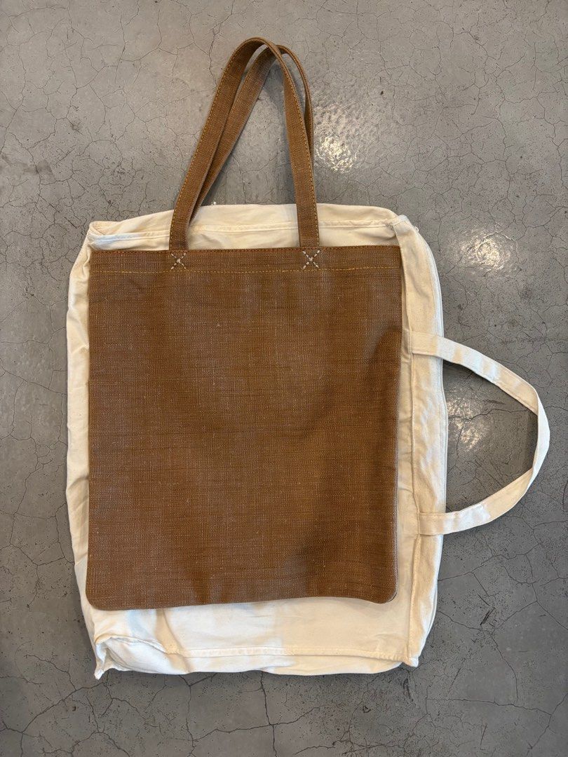 Visvim Basic Tote (L) - Brown (Category: Tote Bags) located in Singapore. Submitted by nonsensical86 (Listing ID 1382363578, Image 2). Description: - Visvim Basic Tote (L) in brown - Canvas exterior - Small interior pocket - Very good condition.