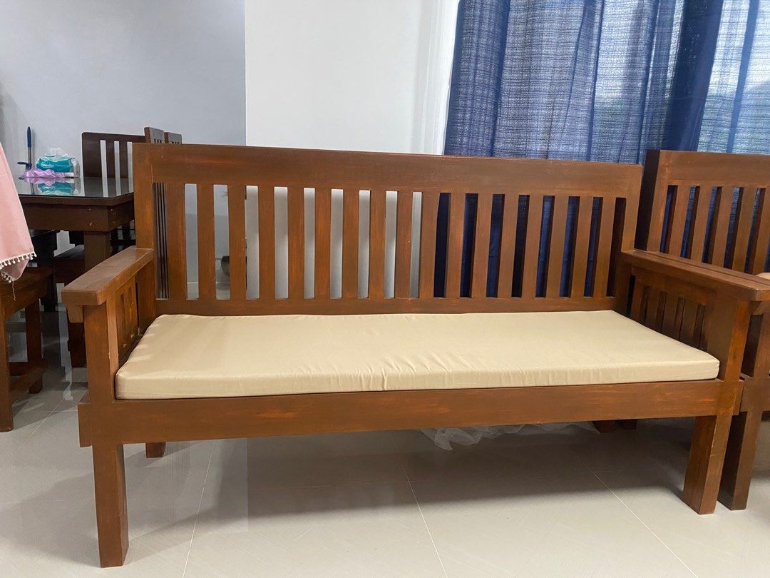 Wooden sofa set (Category: Sofas) located in Makati City. Submitted by enamani1995 (Listing ID 1382393596, Image 3). Description: Mahogany wood material, the two long wooden sofa comes with soft foams and a coffee table. located at general trias cavite, delivery will be shouldered by the buyer..