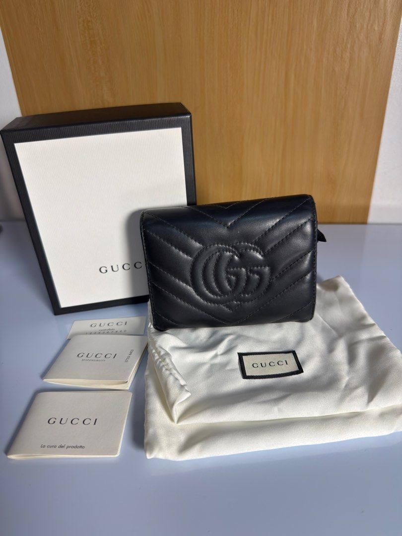 Authentic GG Marmont Compact Wallet (Category: Luxury Bags & Wallets) located in Paoay. Submitted by ysmattic (Listing ID 1382575532, Image 3). Description: Guaranteed authentic GG compact wallet. Complete inclusions. Flaws are the ripped lining in the coin compartment, pa change na lang sa Mr. Quickie and tarnished GG logo. .