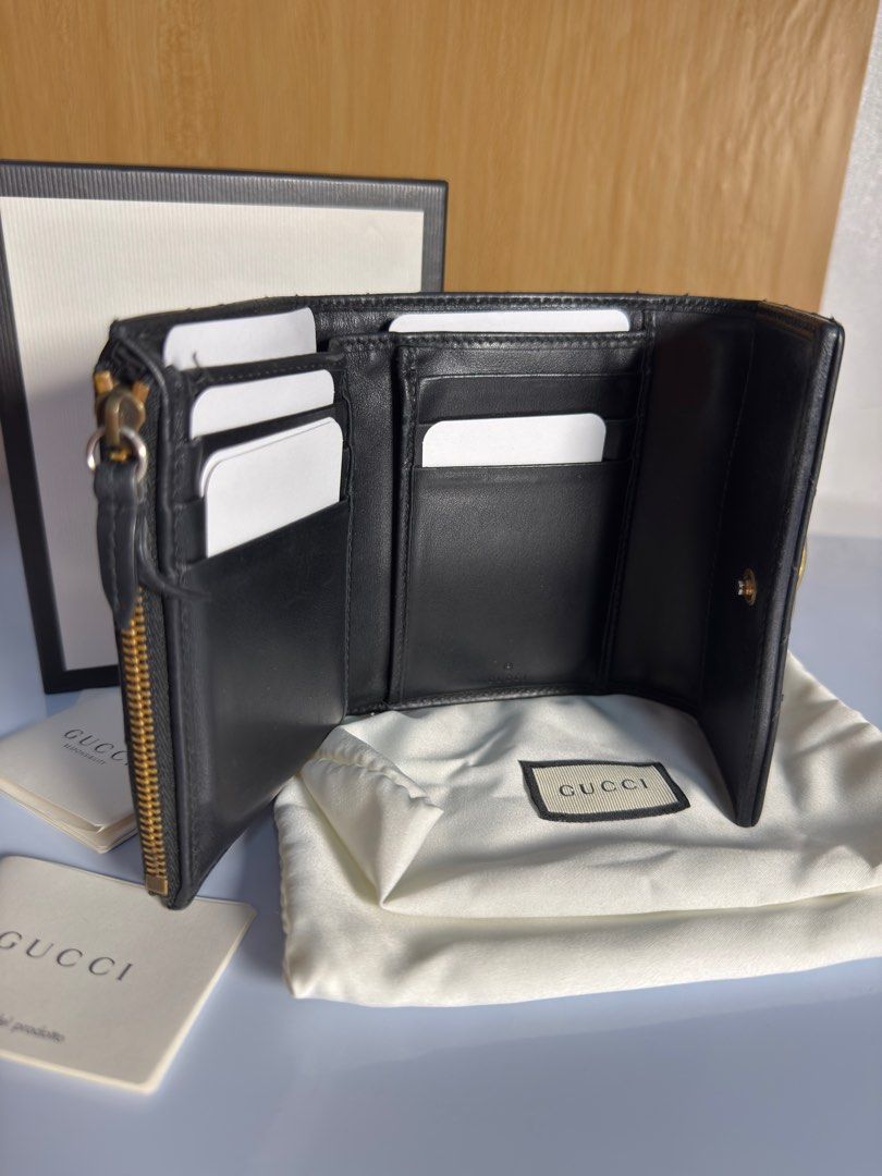 Authentic GG Marmont Compact Wallet (Category: Luxury Bags & Wallets) located in Paoay. Submitted by ysmattic (Listing ID 1382575532, Image 2). Description: Guaranteed authentic GG compact wallet. Complete inclusions. Flaws are the ripped lining in the coin compartment, pa change na lang sa Mr. Quickie and tarnished GG logo. .