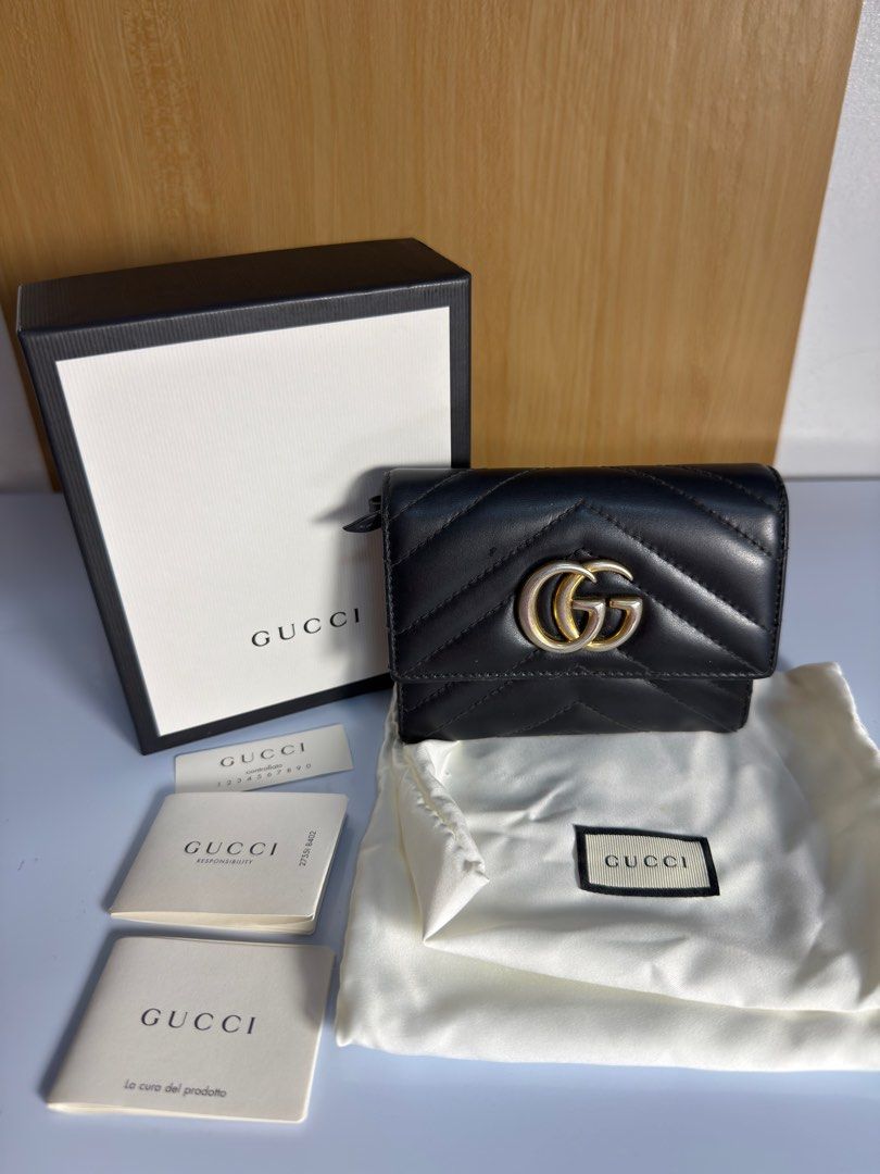 Authentic GG Marmont Compact Wallet (Category: Luxury Bags & Wallets) located in Paoay. Submitted by ysmattic (Listing ID 1382575532, Image 1). Description: Guaranteed authentic GG compact wallet. Complete inclusions. Flaws are the ripped lining in the coin compartment, pa change na lang sa Mr. Quickie and tarnished GG logo. .